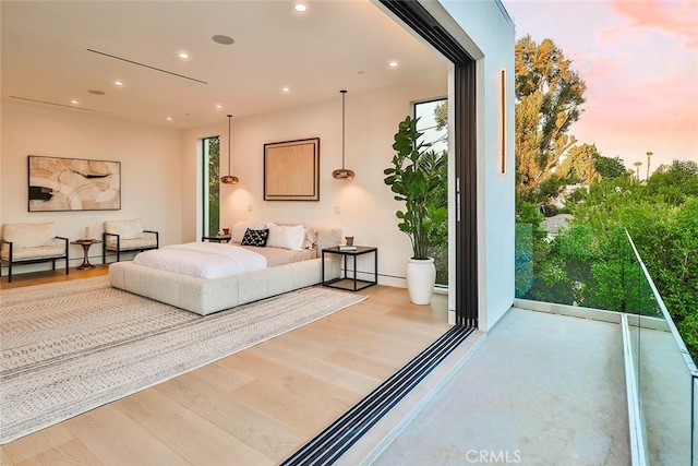 bedroom with hardwood / wood-style floors