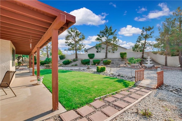 view of yard with a patio area and fence