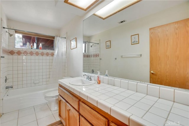 bathroom with shower / bath combo, visible vents, toilet, tile patterned flooring, and vanity