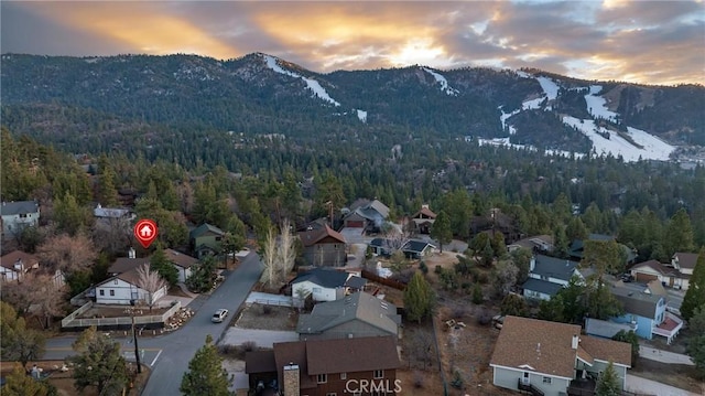 aerial view at dusk with a mountain view