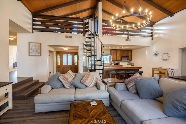 living room with wood ceiling, dark hardwood / wood-style floors, a chandelier, and lofted ceiling with beams