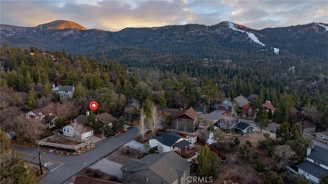 aerial view at dusk with a mountain view