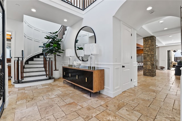 foyer with decorative columns