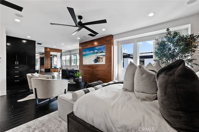 bedroom featuring dark hardwood / wood-style floors and ceiling fan