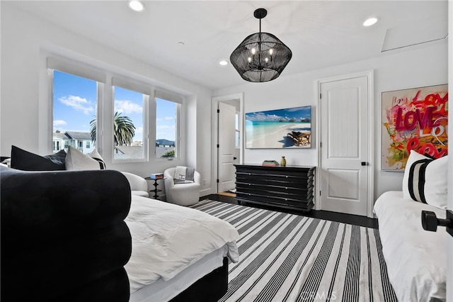 bedroom with hardwood / wood-style floors