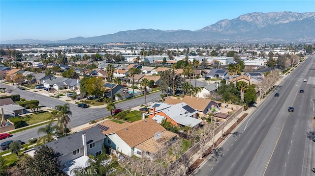 birds eye view of property with a residential view and a mountain view