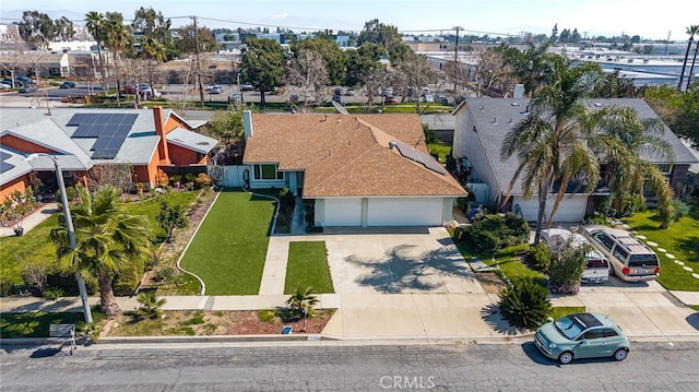 birds eye view of property with a residential view