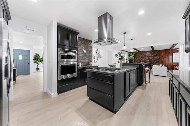 kitchen featuring light hardwood / wood-style flooring, hanging light fixtures, stainless steel appliances, a center island, and island exhaust hood