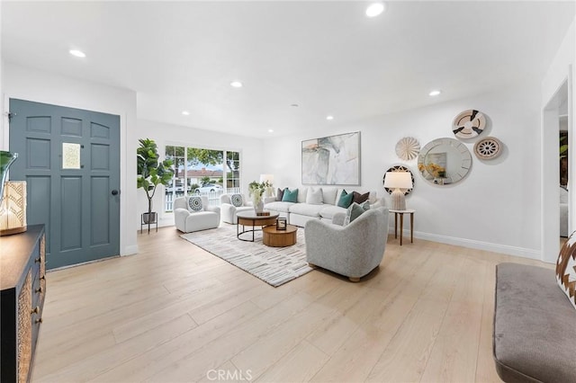 living room with light hardwood / wood-style floors