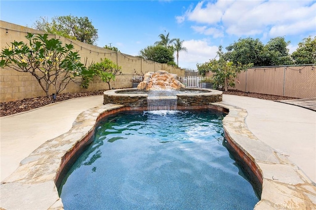 view of swimming pool featuring pool water feature