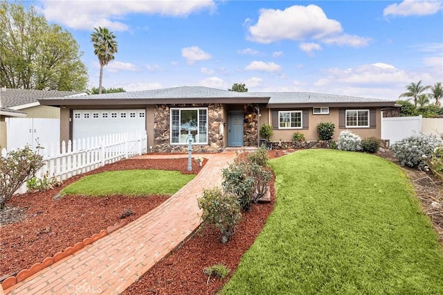 ranch-style home with a garage and a front yard