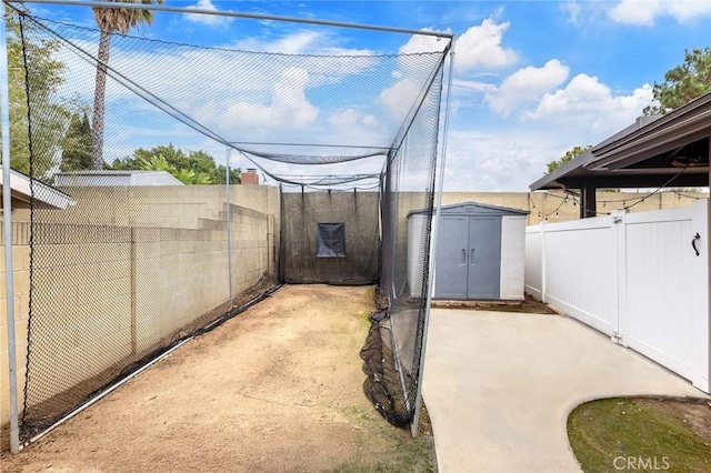 view of yard featuring a storage shed and a patio