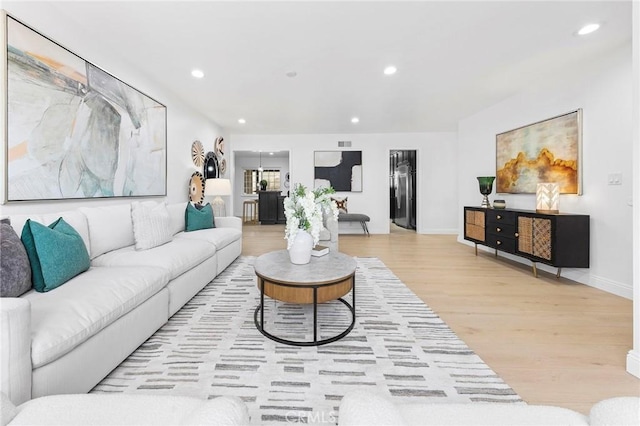 living room featuring light wood-type flooring