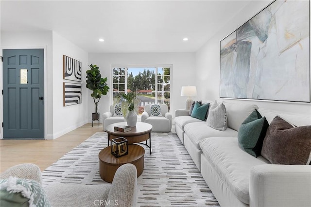 living room featuring light wood-type flooring