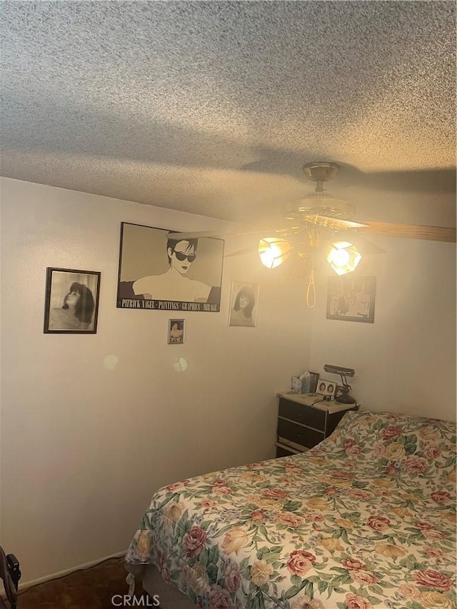 bedroom featuring a textured ceiling