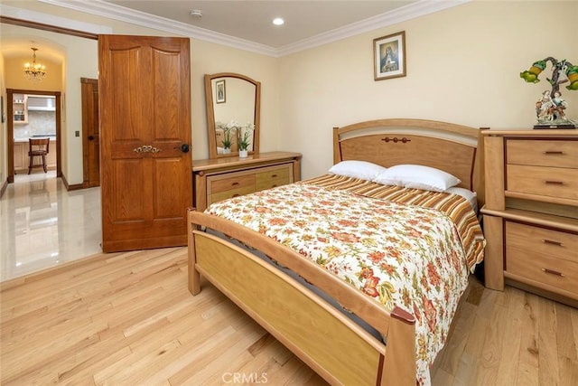 bedroom with ornamental molding, an inviting chandelier, recessed lighting, and light wood-style floors