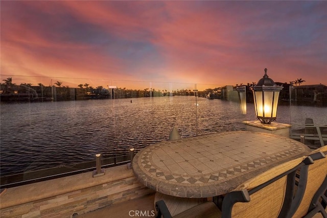 view of dock with a water view