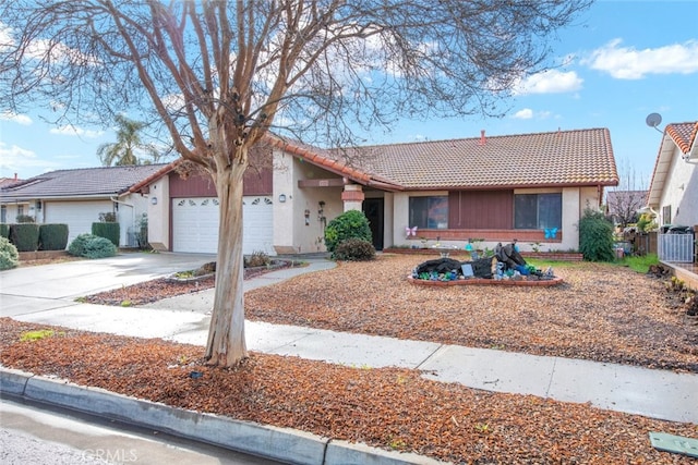 single story home with a garage