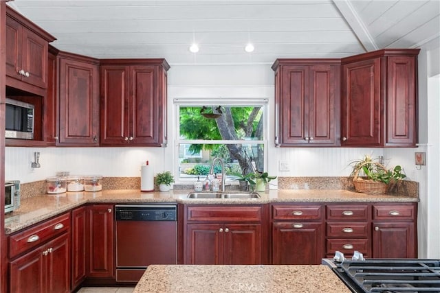 kitchen with beam ceiling, sink, dishwashing machine, and light stone counters