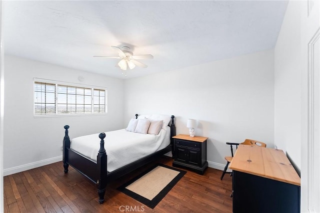 bedroom featuring dark hardwood / wood-style floors and ceiling fan