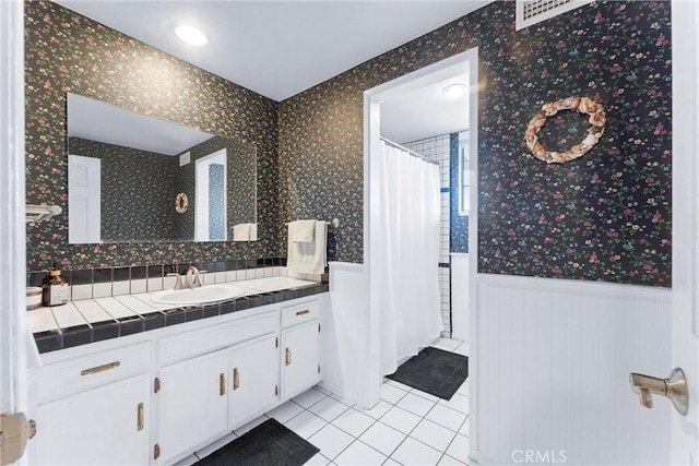 bathroom featuring vanity and tile patterned floors