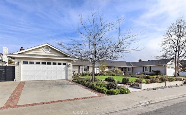 single story home with a garage