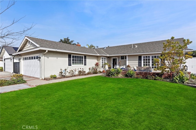 ranch-style home featuring a garage and a front lawn