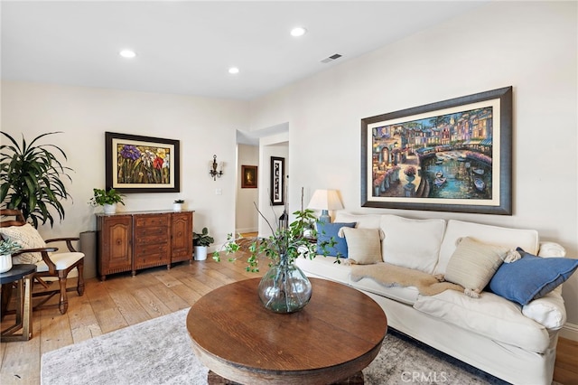 living room with light hardwood / wood-style floors