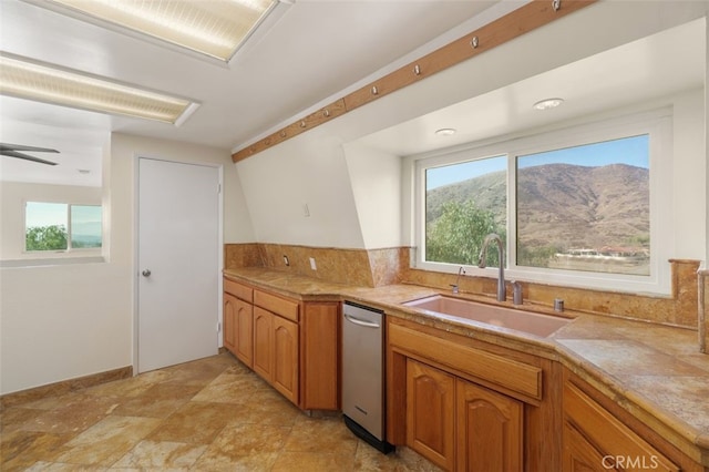 kitchen featuring a mountain view and sink