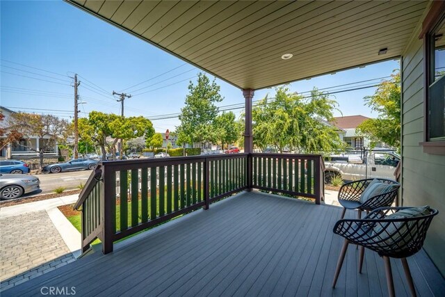 wooden deck with a porch