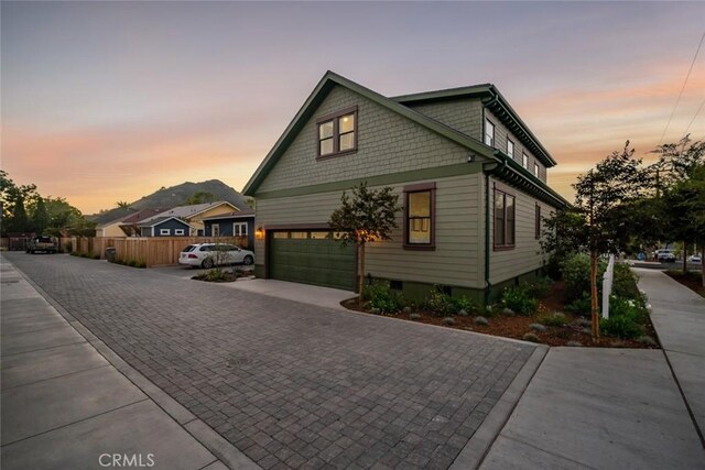 view of front of home with a garage