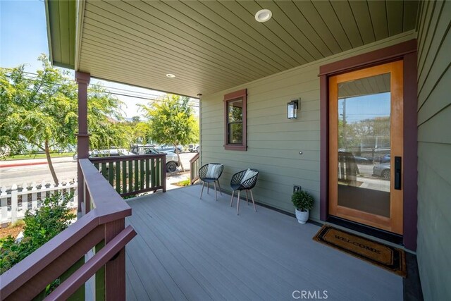 wooden terrace with covered porch