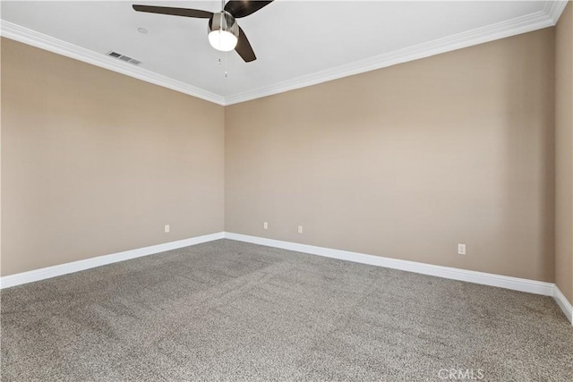 spare room with ceiling fan, ornamental molding, and carpet flooring