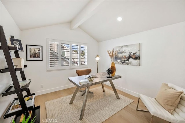 office area featuring light hardwood / wood-style flooring and vaulted ceiling with beams