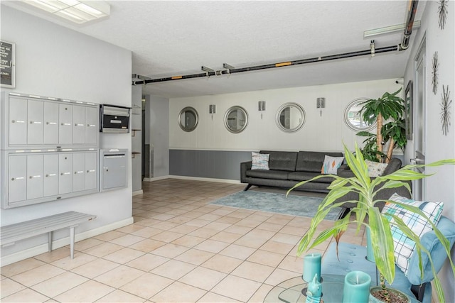 tiled living room with a textured ceiling