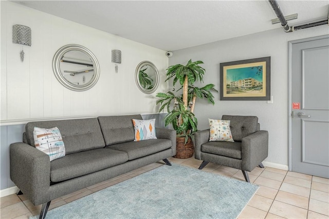 living room with light tile patterned floors