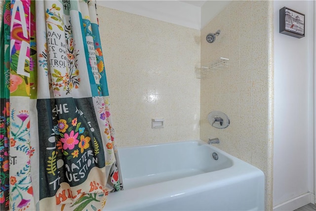 bathroom with shower / tub combo with curtain