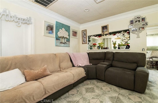 living room featuring crown molding and a textured ceiling