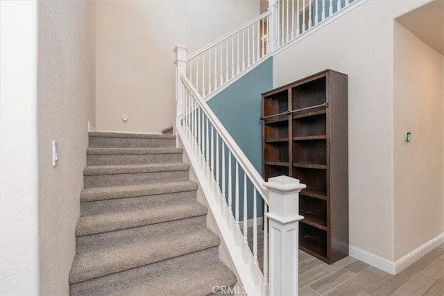 315 Timberline Way S, Madera, CA 93636 - staircase featuring wood finished floors and baseboards