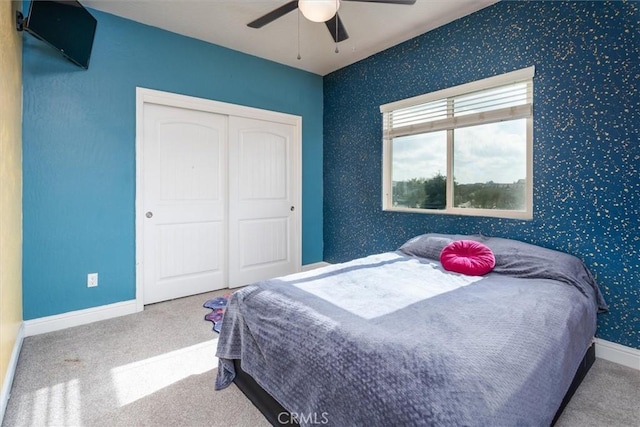 315 Timberline Way S, Madera, CA 93636 - bedroom featuring carpet flooring, baseboards, a closet, a ceiling fan, and wallpapered walls