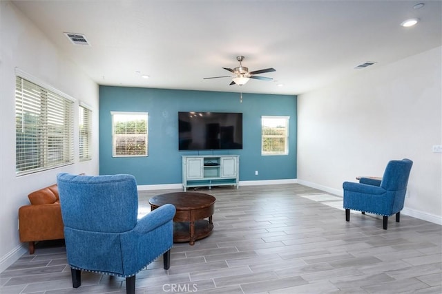 315 Timberline Way S, Madera, CA 93636 - living room with ceiling fan, plenty of natural light, baseboards, recessed lighting, and wood finished floors