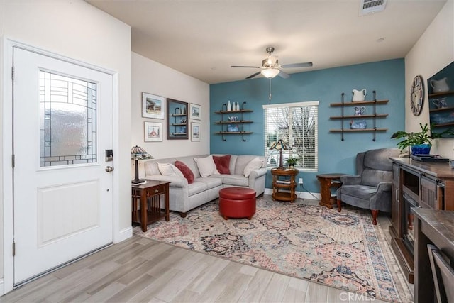 315 Timberline Way S, Madera, CA 93636 - living room with wood finished floors, a ceiling fan, and baseboards