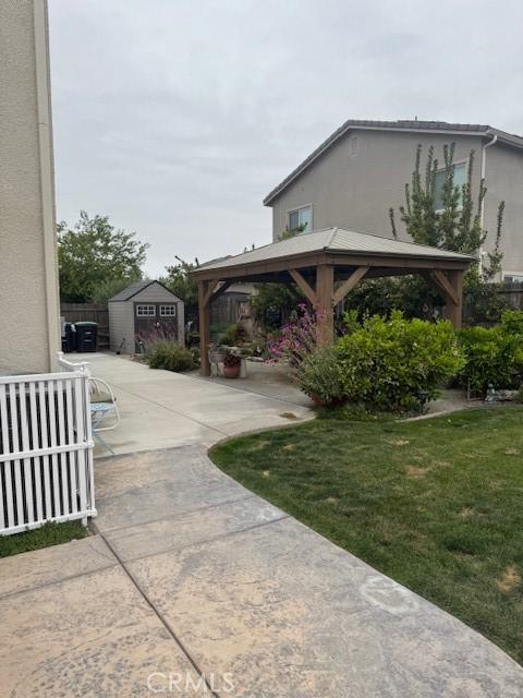 315 Timberline Way S, Madera, CA 93636 - view of property exterior featuring a gazebo and stucco siding