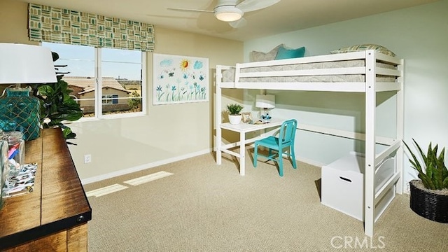 bedroom with ceiling fan and carpet flooring