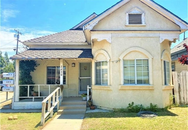 26302632 L St Unit A, B, C, Bakersfield, CA 93301 - view of front of home featuring stucco siding and a porch