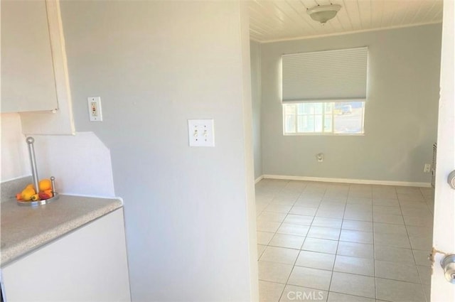26302632 L St Unit A, B, C, Bakersfield, CA 93301 - kitchen featuring light tile patterned floors, baseboards, and light countertops