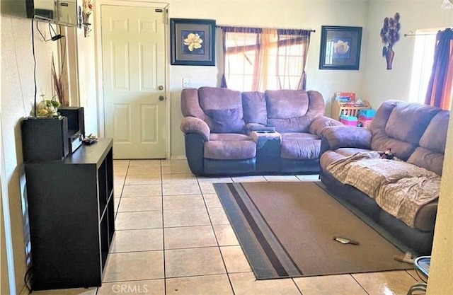 26302632 L St Unit A, B, C, Bakersfield, CA 93301 - living room featuring light tile patterned flooring and plenty of natural light
