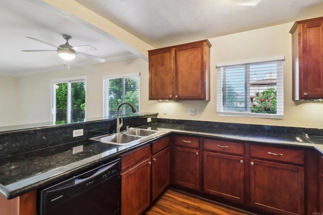 kitchen featuring sink, dark wood-type flooring, kitchen peninsula, and dishwasher