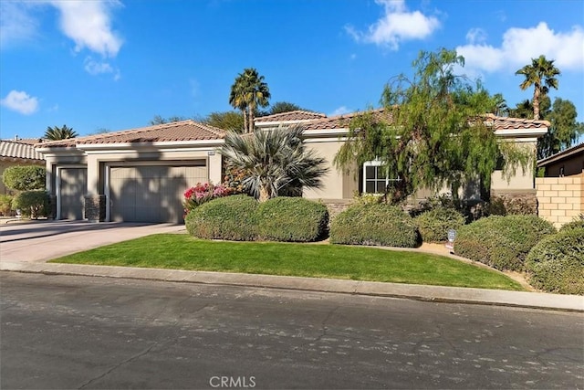 mediterranean / spanish-style house featuring a garage