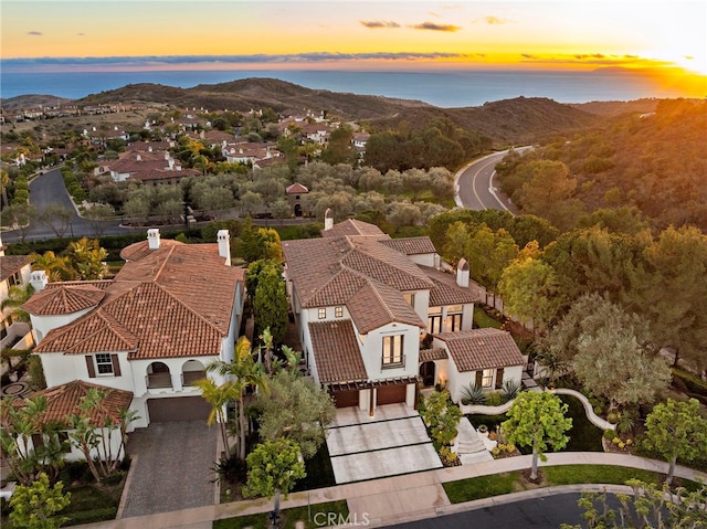 aerial view at dusk with a mountain view